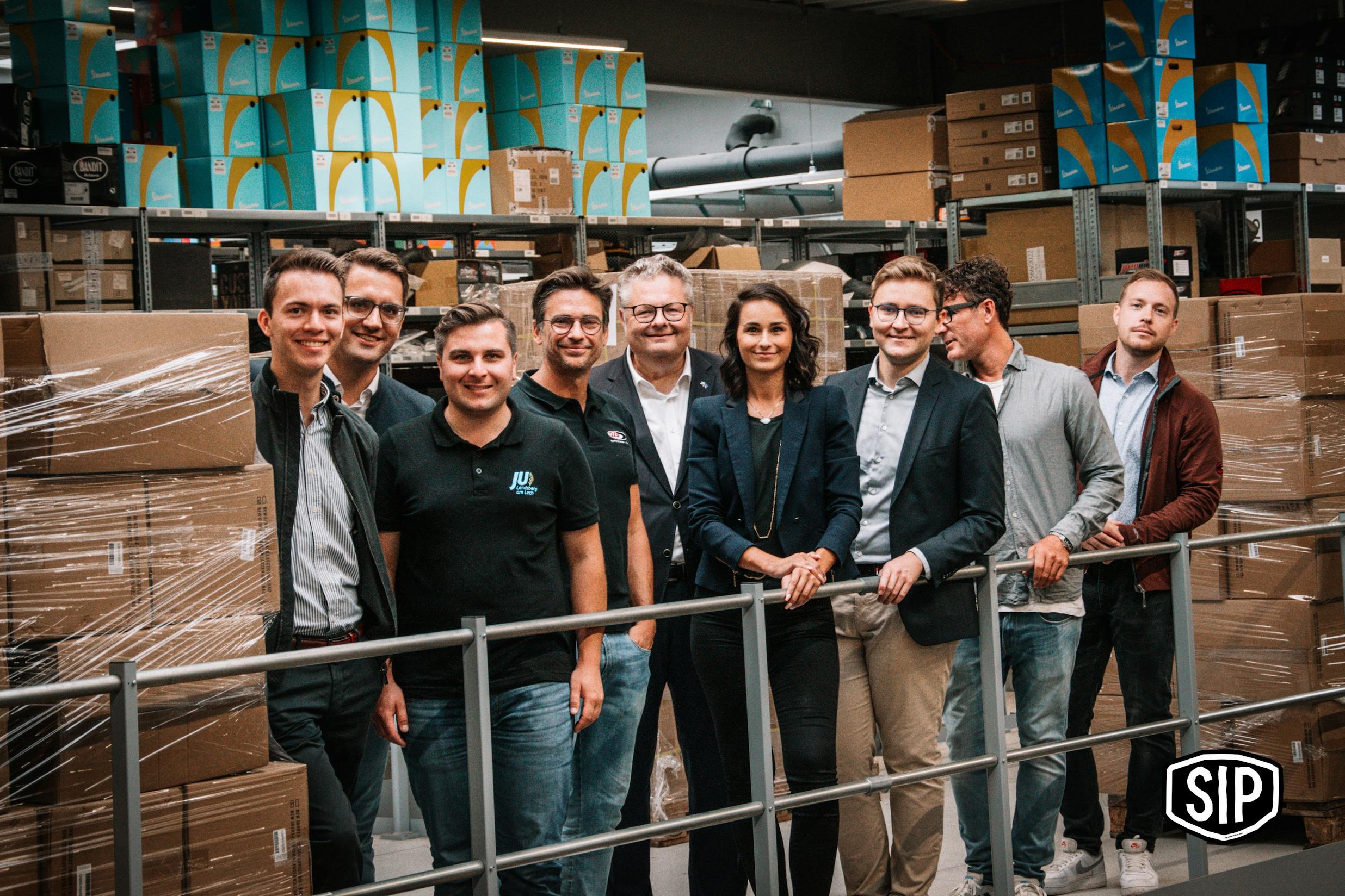 Christian Doleschal MEP (2nd from left) and Alex Dorow MP (centre) visited SIP Scootershop.